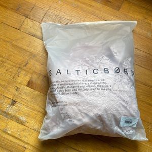 Ballistic born, blush colored, maid of honor dress.